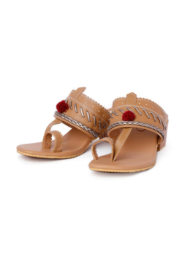 Elegant tan and silver vegan leather heels with pom pom accents